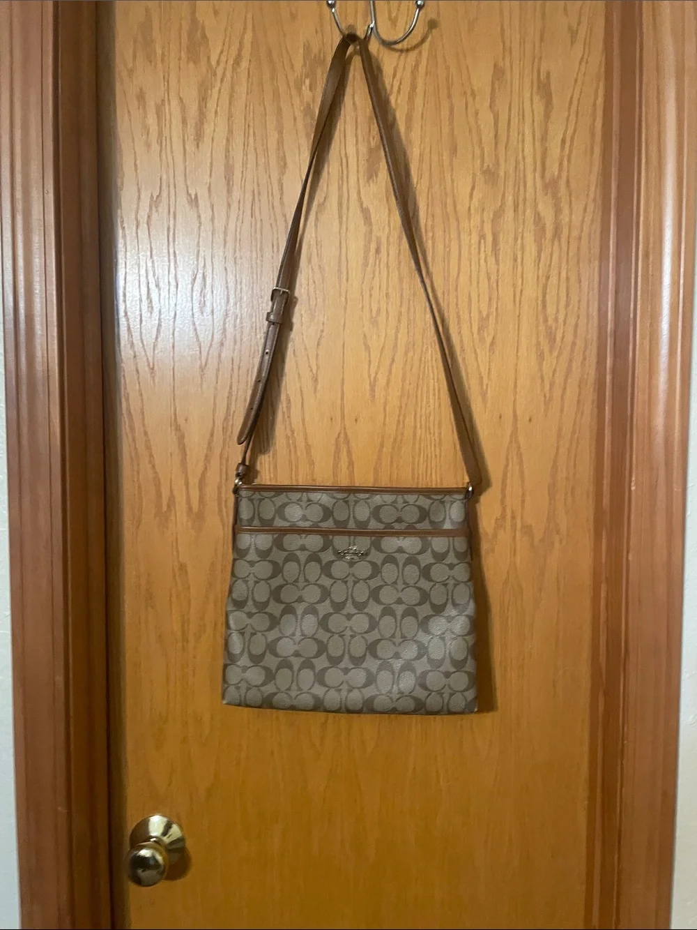 Coach signature file crossbody bag